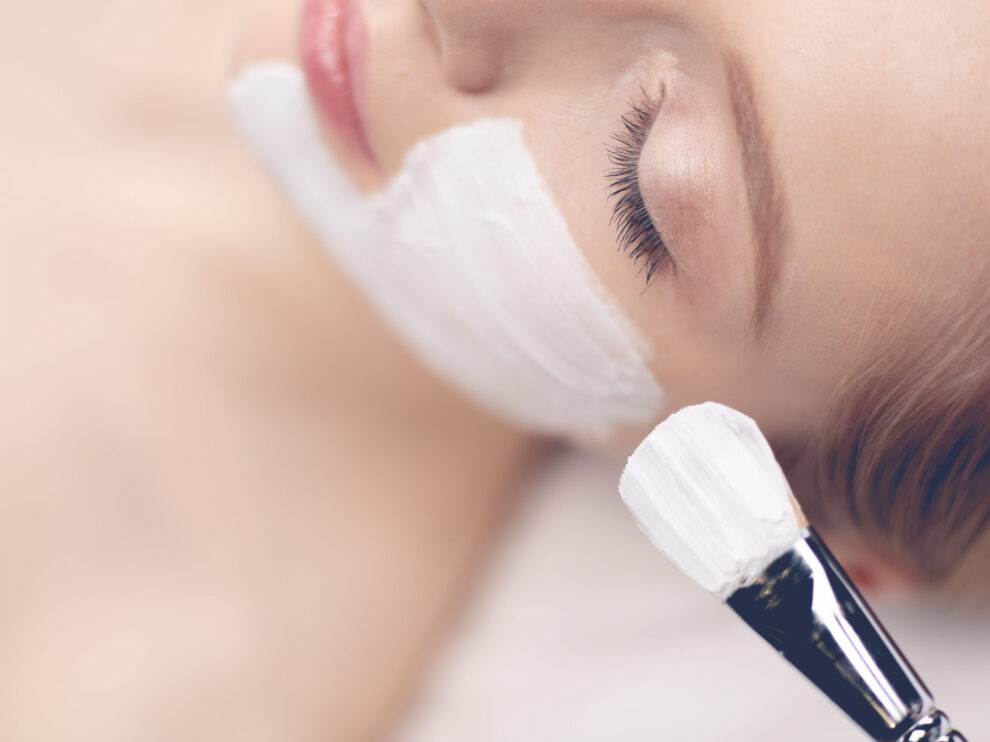 Spa facial mask application. Spa beauty organic facial mask application at day spa salon. chemical peel for wrinkles